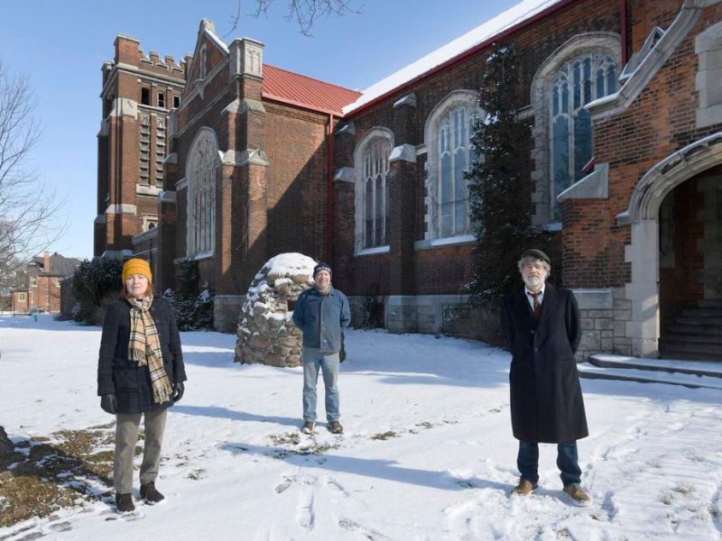 Janet Long, Walter Furlan, and Lance Darren Cole in front of St. Giles Church